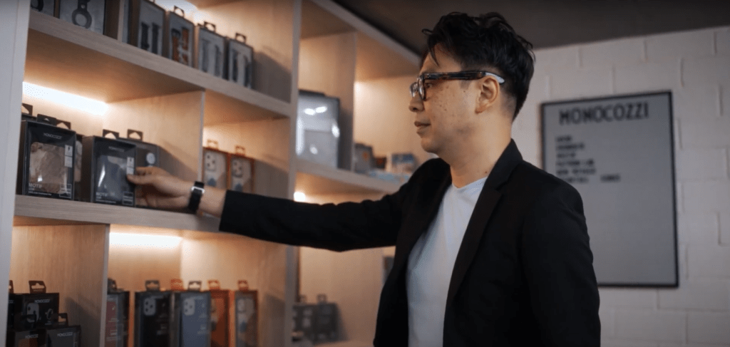 Jeffrey Chan, the CEO of Monocozzi looking at the shelf.